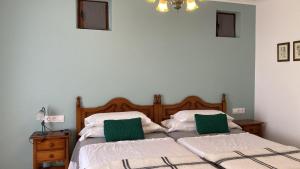 Postel nebo postele na pokoji v ubytování Posada Las Torres
