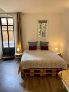 Postel nebo postele na pokoji v ubytování Casa-Belle