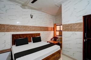 Giường trong phòng chung tại Np Ji Hotel