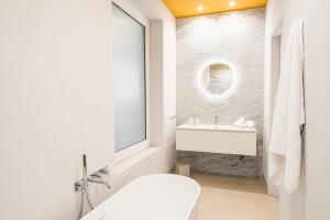 A bathroom at Loggiato Verga Luxury by Bed&Bros