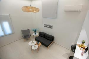Posezení v ubytování Mylos Modern Apartments,By Idealstay Experience