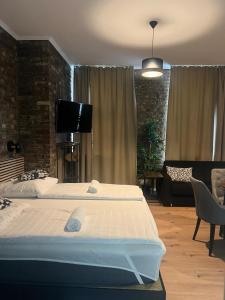 TV a/nebo společenská místnost v ubytování Hotel Soers
