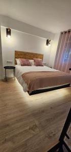 Cama o camas de una habitación en Loft Puerta Almodovar