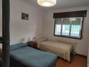 Postel nebo postele na pokoji v ubytování QUINTA ANDAINA