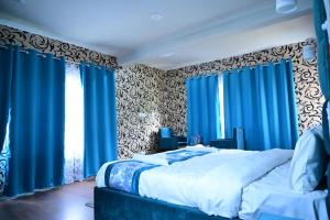 Voodi või voodid majutusasutuse Sarwa Cottage toas