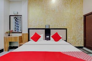 Łóżko lub łóżka w pokoju w obiekcie OYO Flagship 73630 Hotel Riz