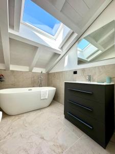Bagno di Apt. Aries - Penthouse Menaggio