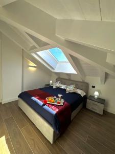 Letto o letti in una camera di Apt. Aries - Penthouse Menaggio