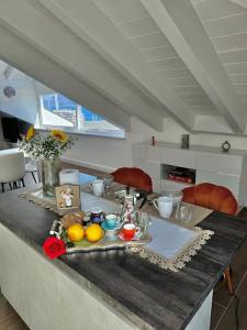 Cucina o angolo cottura di Apt. Aries - Penthouse Menaggio