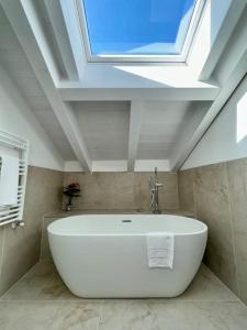 Bagno di Apt. Aries - Penthouse Menaggio