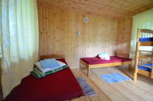 Postel nebo postele na pokoji v ubytování Karujärve Camping
