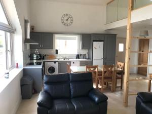 Kuchyň nebo kuchyňský kout v ubytování Sarahs Beachouse
