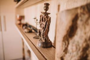 a wooden object sitting on top of a counter at Villa Hidden Gem Crete in Pangalochori