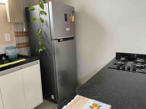 Kuchyň nebo kuchyňský kout v ubytování 7 - Apartamento tranquilo e charmoso