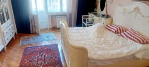 Кровать или кровати в номере Michael's Classy Apartment