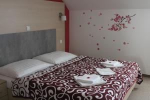 Postel nebo postele na pokoji v ubytování Apartments Verona Karlovy Vary