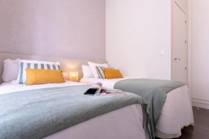 Posteľ alebo postele v izbe v ubytovaní Genteel Home Larios