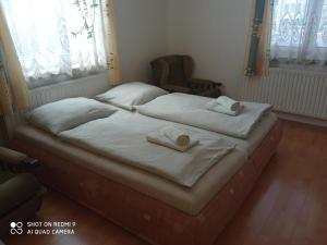 Postel nebo postele na pokoji v ubytování Apartmány v centru