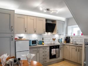 Apple Blossom Cottage - Uk46648 tesisinde mutfak veya mini mutfak