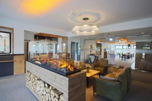 Posezení v ubytování Hotel Grohnder Fährhaus