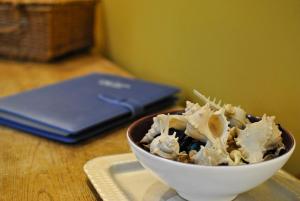 a bowl of food sitting on a table at The House on the Square- Coastal Townhouse in Saint Monance