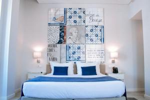 Кровать или кровати в номере Rio Art Hotel