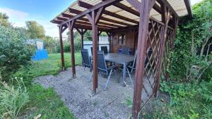 Zahrada ubytování Haus 5 Elemente- Fewo Feuer mit Terrasse, Bio-Kamin und 2 Schlafzimmer + 28 fotografií