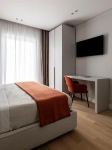 Postel nebo postele na pokoji v ubytování Le Terrazze Suites