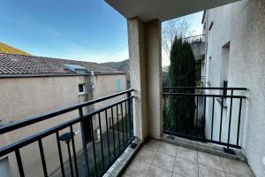 a balcony with a view of a building at Les Naïades G29 - 2 bedrooms for 5 people ! in Avène