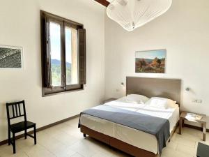 En eller flere senge i et værelse på Mas Rossignol Apartment with 3 Balconies