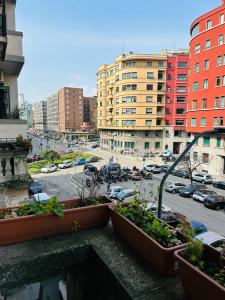 a view of a city from a balcony at Hostel Boutique in Milan