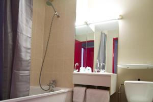 Koupelna v ubytování Hotel Ecluse 34