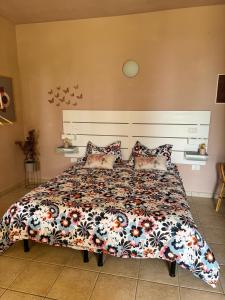 A bed or beds in a room at Agriturismo Corte San Girolamo