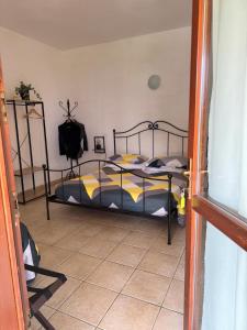 A bed or beds in a room at Agriturismo Corte San Girolamo