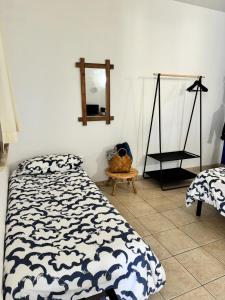 A bed or beds in a room at Agriturismo Corte San Girolamo