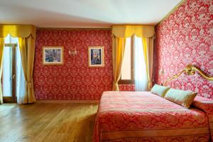 Postel nebo postele na pokoji v ubytování Residenza Ca' San Marco