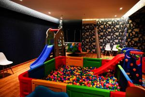 a childs play room with a play set with balls at Villa Misk Dammam in Dammam