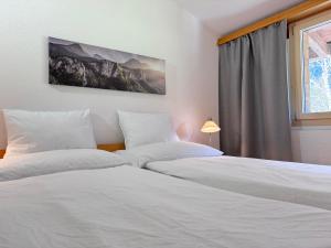 Katil atau katil-katil dalam bilik di Hotel Restaurant Urweider