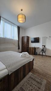 Voodi või voodid majutusasutuse Neva Apartments toas