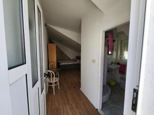 Postel nebo postele na pokoji v ubytování Apartmani Sole