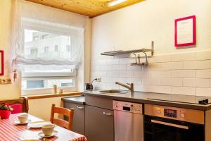 Kuchyň nebo kuchyňský kout v ubytování Ferienwohnung Fischer