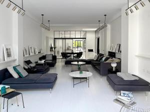 Area tempat duduk di Maison Monoï séjour créatif avec activités, spa et services