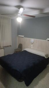 Letto o letti in una camera di HOSTAL CEPA DE ORO