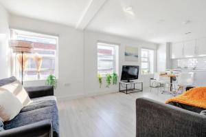 Predel za sedenje v nastanitvi 1-Bed in Bricklane Shoreditch - 5 Sleeps