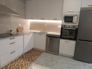 Kuchnia lub aneks kuchenny w obiekcie Vivienda en el casco histórico de Baiona