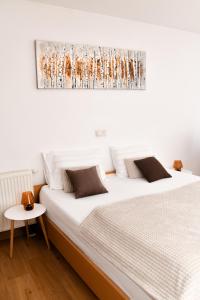 Postel nebo postele na pokoji v ubytování Miadora apartments - Apartma Idina