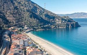 an aerial view of a beach with houses and the water at Gorgeous Home In Scilla With Kitchen in Scilla