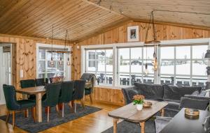 A restaurant or other place to eat at Pet Friendly Home In Engerdal With Kitchen