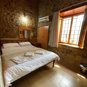 A bed or beds in a room at Held Hotel