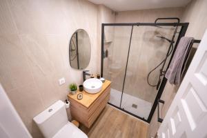 Salle de bains dans l'établissement Apartasuites Royal Zahara, Máximo confort con vistas al mar
